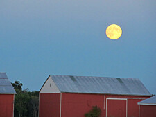 Moon over barn
